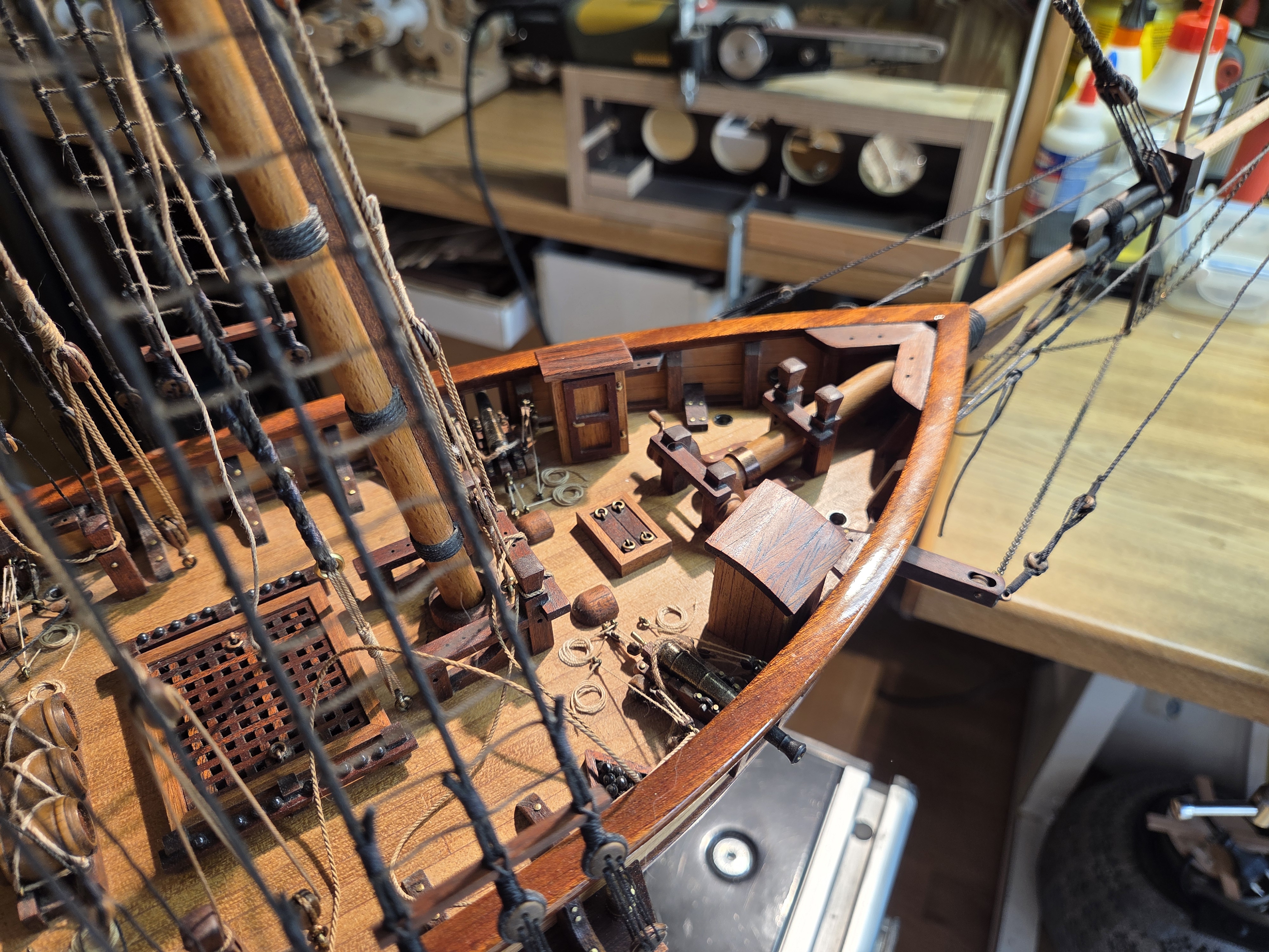 Foredeck of the Harvey seen from the bow, showing the gratings, windlass and belaying pins