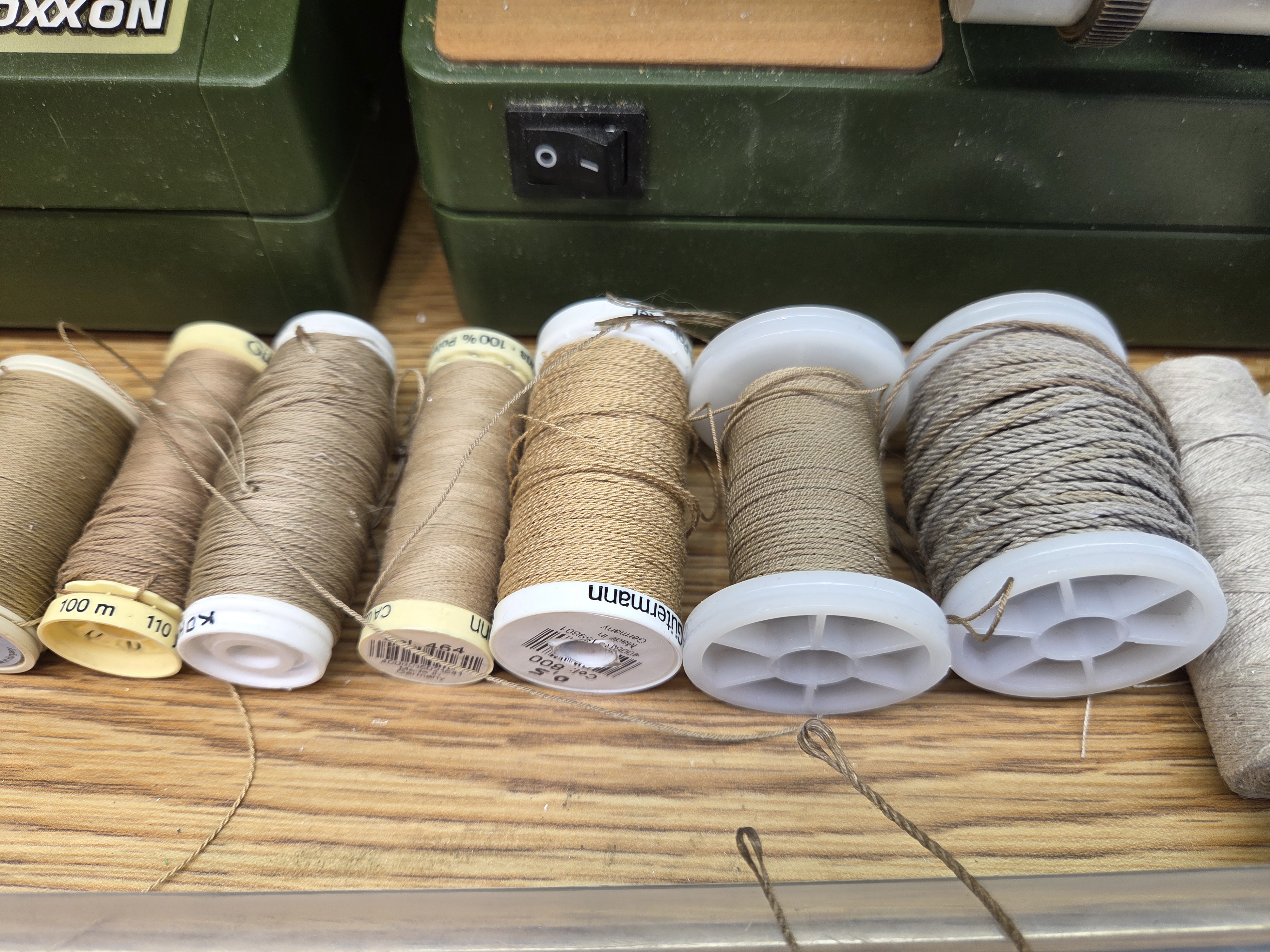Spools of thread, the raw material the RopeMaster turns into scale rope